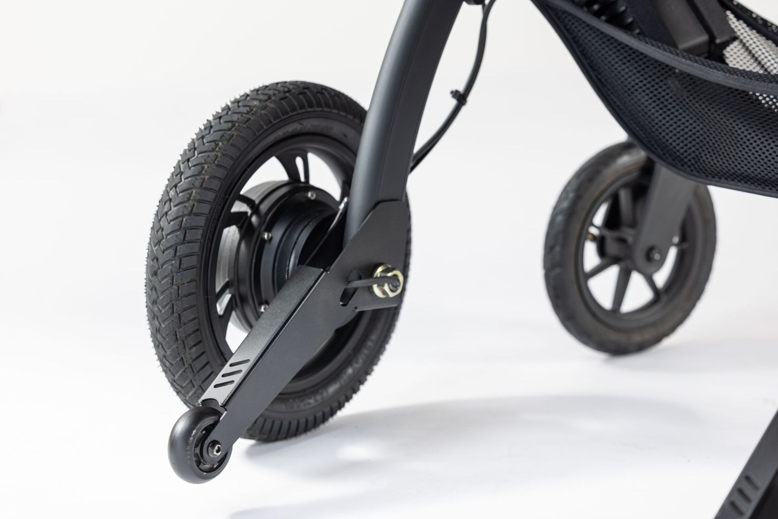 Close-up of a rollator frame and wheels