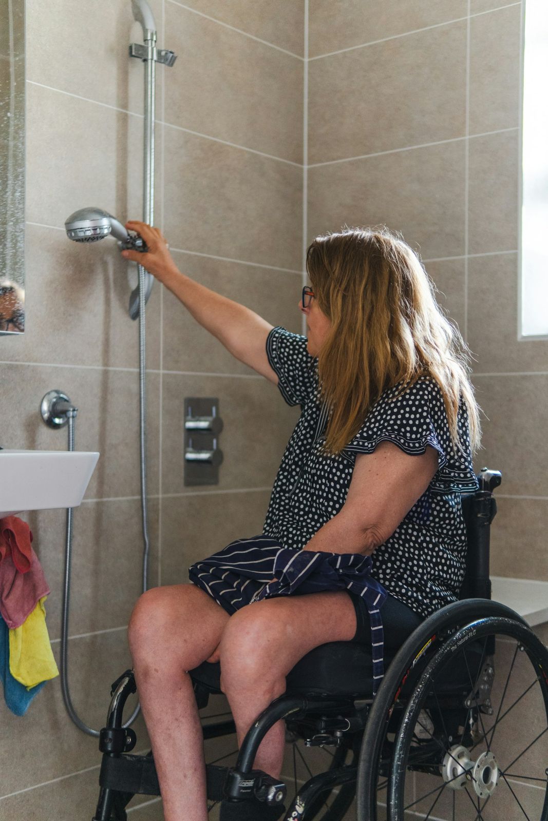 An accessible bathroom with grab rails