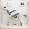 ShowerBuddy Roll-InBuddy Tilt shower commode chair with aluminium frame and padded seat