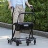U-Step 2 walking stabiliser with U-shaped frame, fold up seat and basket, black