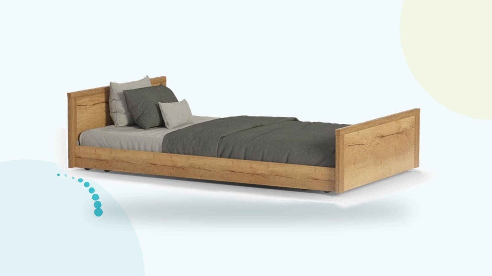 A Malsch home care bed made up with bedding, side rails down