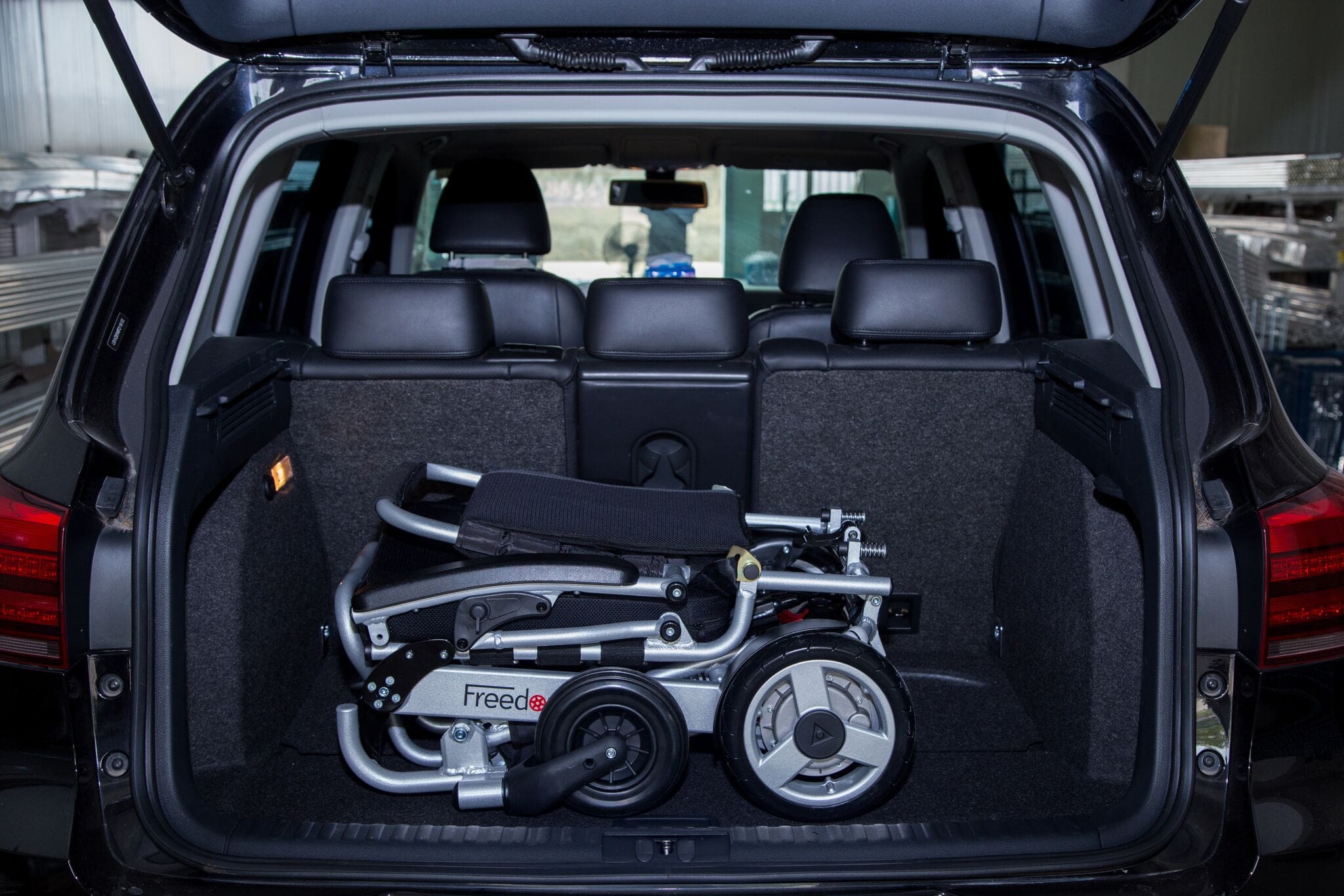 Freedom Chair DE08L Premium Lite Sport, folded in a car boot
